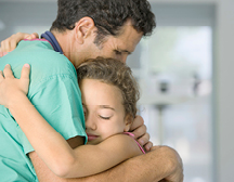 two people hugging each other