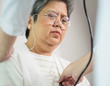 doctor taking heartbeat