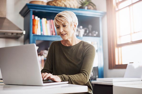 a woman working on a laptop