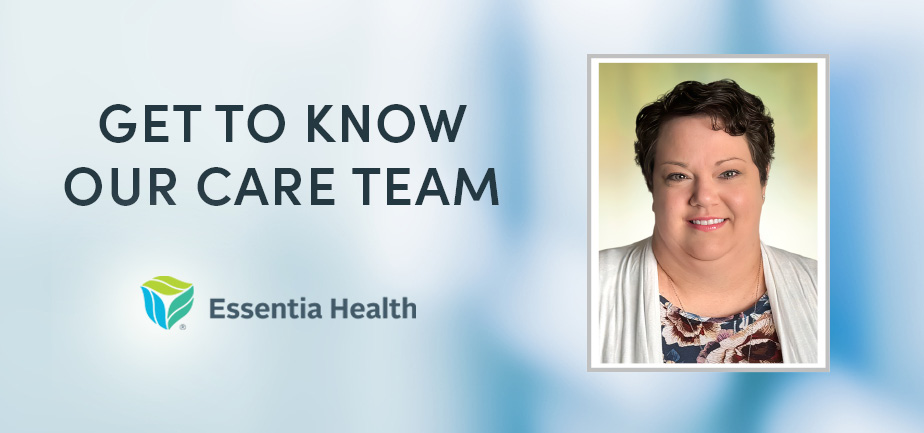 woman with short black hair smiling